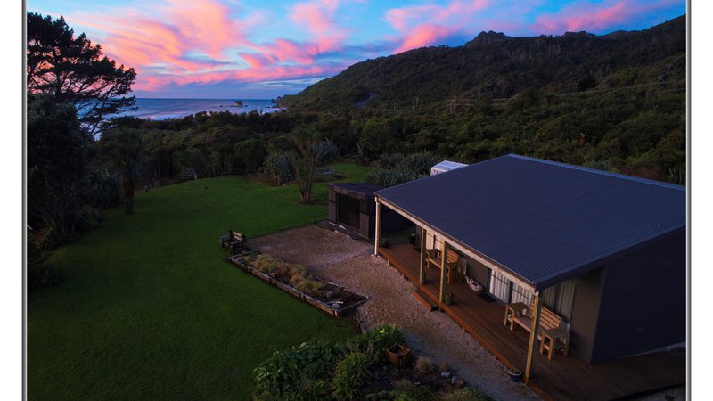 Breakers boutique accommodation on sunset from annex building looking at Tasman Sea.jpg