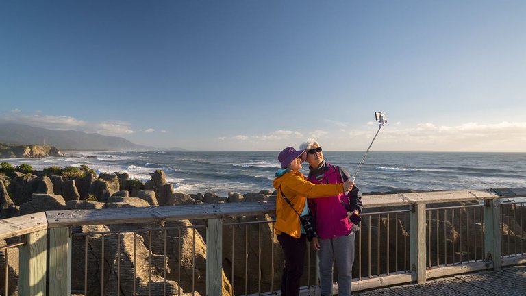 Taking Photos at Punakaiki.JPG
