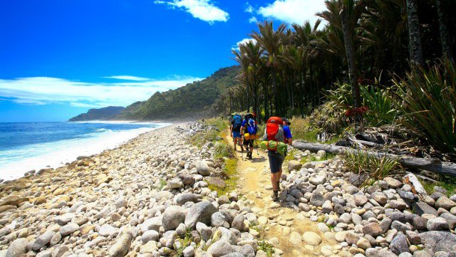 Trampers on Heaphy beach_O4.jpg